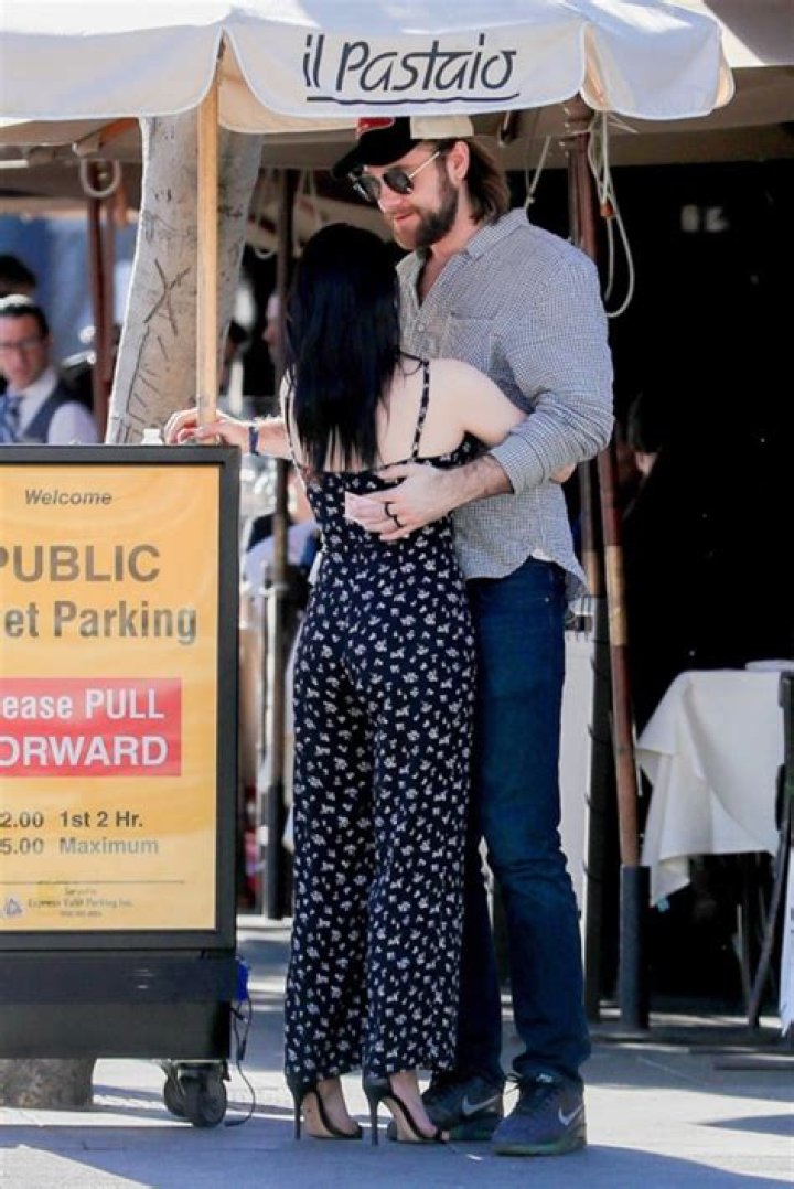 Ariel Winter holds on tight to Luke Benward