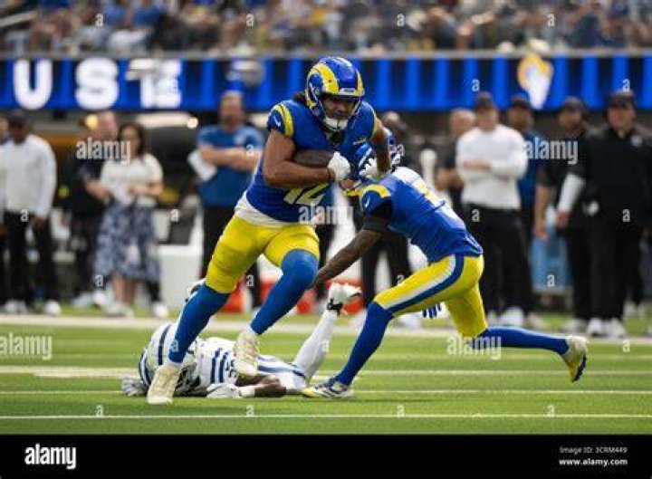 Los Angeles Rams wide receiver Odell Beckham Jr. (3) kisses his wife Lauren Wood before taking on the Cincinnati Bengals in Super Bowl 56, in Inglewood, Calif. The Rams defeated the Bengals 23-20 Rams Bengals Super Bowl Football, Inglewood, United States - 13 Feb 2022