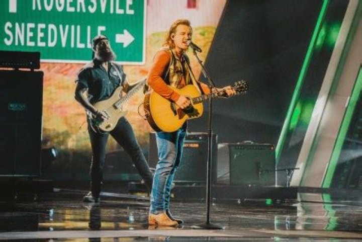 May be used worldwide until Nov 11, 2021, solely for news coverage and editorial information purposes of the CMA Awards. The following credit is required: Photo: {Photographer Name}/ Country Music Association, Inc. &copy; Country Music Association, Inc. All rights reserved. Mandatory Credit: Photo by Nick Zimmer/Country Music Association Inc./Shutterstock (11012570x) Morgan Wallen performs "More Than My Hometown" at "The 54th Annual CMA Awards," on Wednesday, November 11, 2020; live on ABC from Music City Center in Downtown Nashville. 54th Annual Country Music Association Awards, Show, Nashville, Tennessee, USA - 11 Nov 2020