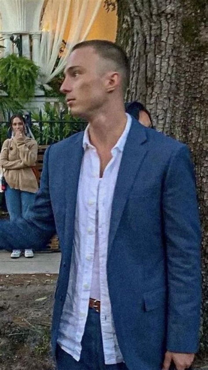 Tyler Cameron in a blue suit